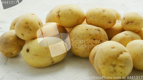 Image of Unpeeled clean potatoes in closeup