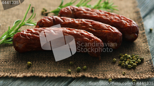 Image of Spices near whole sausages