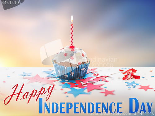 Image of cupcake with candle on american independence day