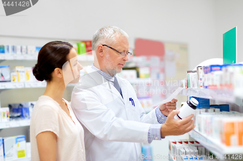 Image of apothecary and woman with drug at pharmacy