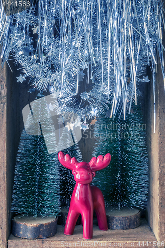 Image of some Christmas decoration in an old wooden box