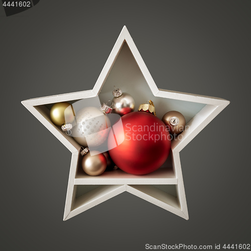 Image of Christmas decoration white star with glass balls inside
