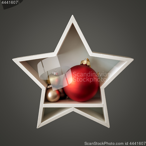 Image of Christmas decoration white star with glass balls inside