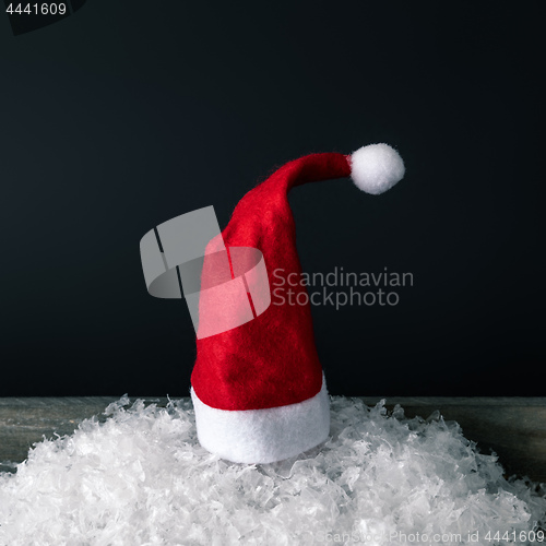 Image of red Santa Claus hat with black background