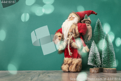 Image of Santa Claus figure bokeh lights