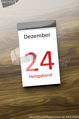 Image of a calendar the 24th of December Christmas Eve text in german lan