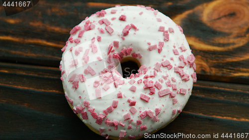 Image of Glazed doughnut with pink sprinkles