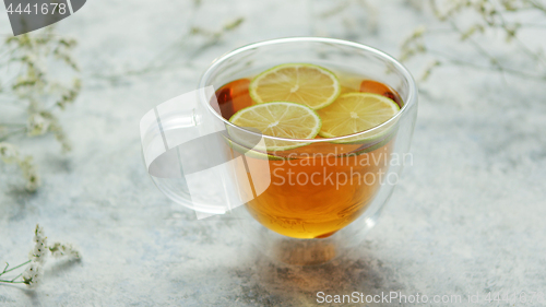Image of Tea with lemon in cup
