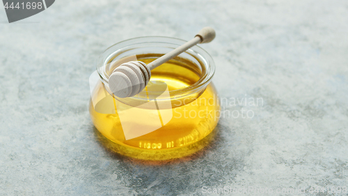 Image of Glass bowl of honey