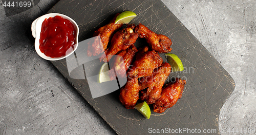 Image of Delicious fried wings on board