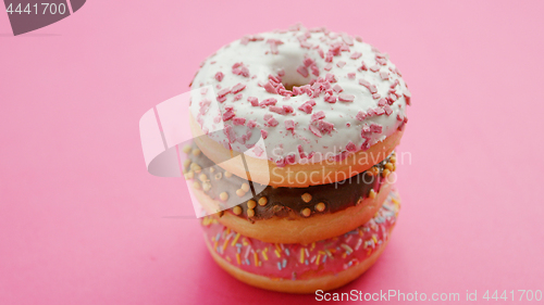 Image of Stack of glazed sweet doughnuts