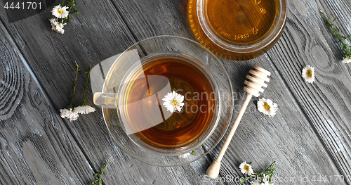 Image of Herbal tea and jar of honey