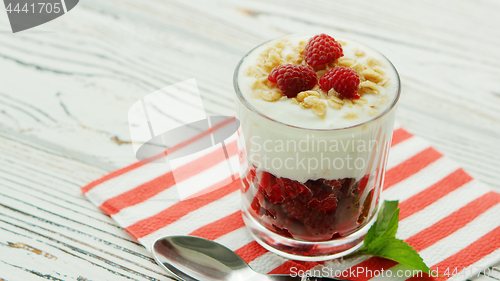 Image of Glass with yogurt and raspberry