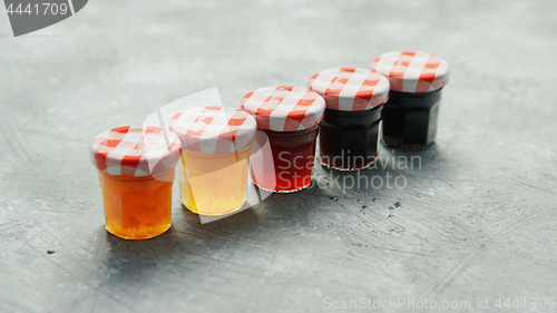 Image of Small cups with different marmalade