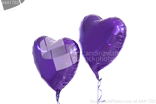 Image of close up of helium balloons over white background