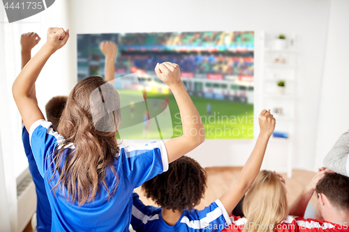 Image of happy friends or football fans watching soccer