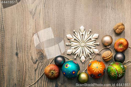 Image of Christmas decoration glass balls on a wooden background