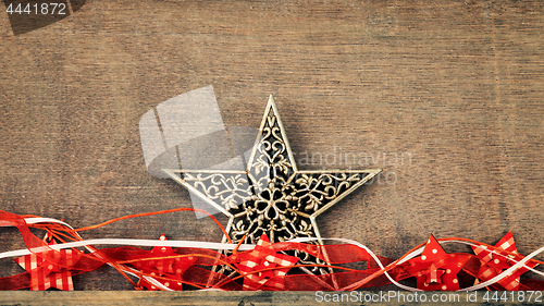 Image of Christmas decoration wooden background with star