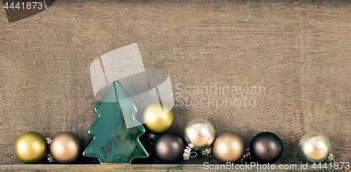 Image of Christmas decoration glass balls with wooden background