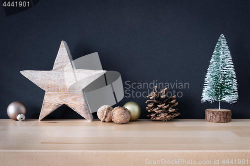 Image of Christmas decoration glass balls with wooden star and fir tree