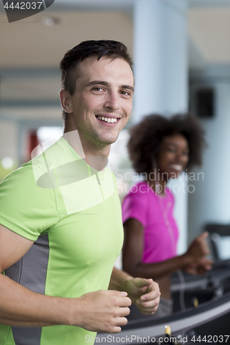 Image of people exercisinng a cardio on treadmill