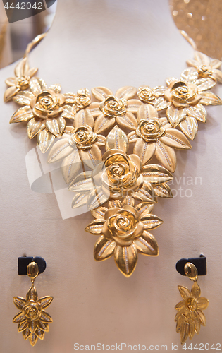 Image of gold jewelry in the shop window