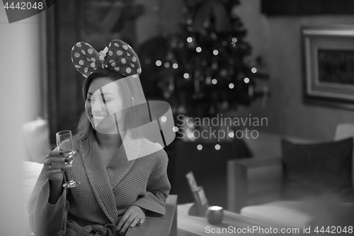 Image of woman drinking champagne at spa