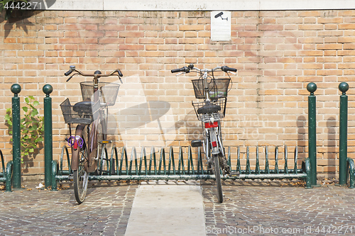 Image of Bicycles parked on street in city