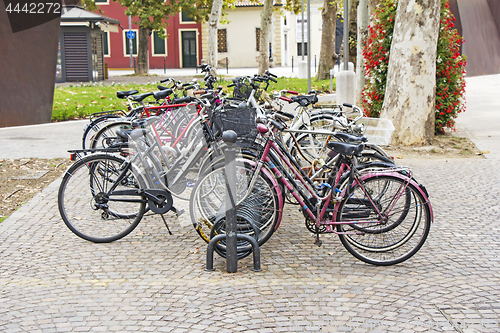 Image of Bicycles parked on street in city