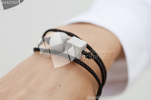 Image of Stylish grey and black bead bracelet on female hand