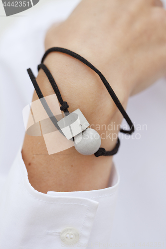 Image of Stylish grey and black bead bracelet on female hand