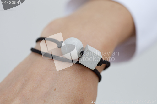 Image of Stylish grey and black bead bracelet on female hand