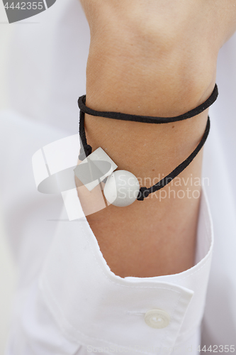 Image of Stylish grey and black bead bracelet on female hand