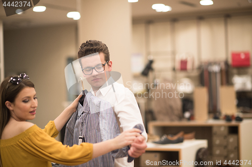 Image of couple in  Clothing Store