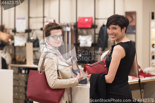 Image of best friend shopping in big mall