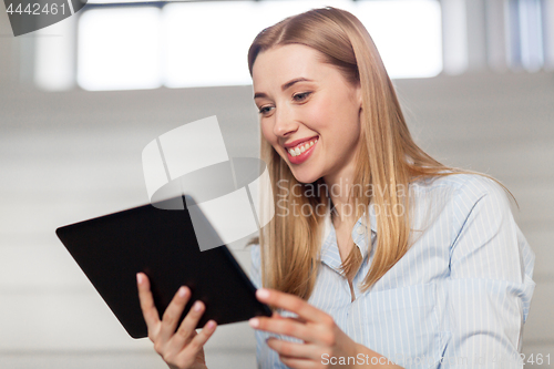 Image of woman or student with tablet pc at office