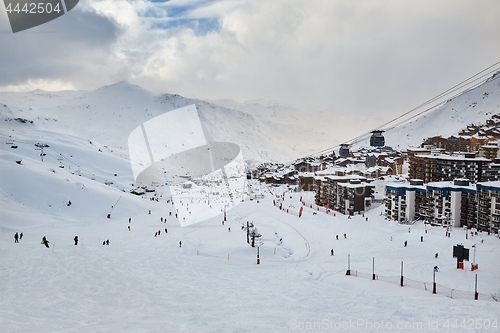 Image of Skiing slopes, with many people