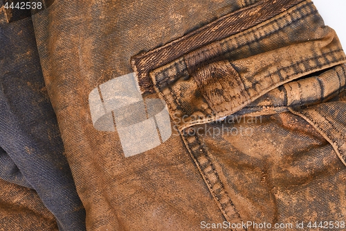 Image of Trousers with mud