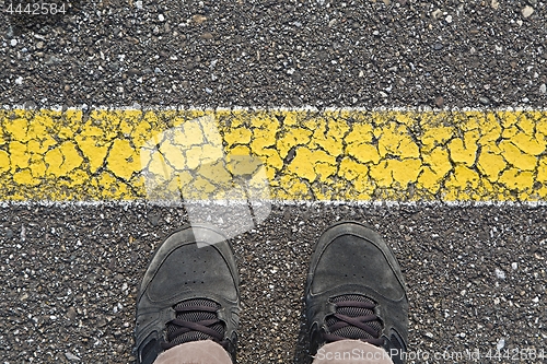 Image of Standing behind the line