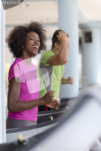 Image of people exercisinng a cardio on treadmill