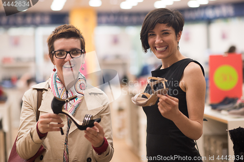 Image of best friend shopping in big mall