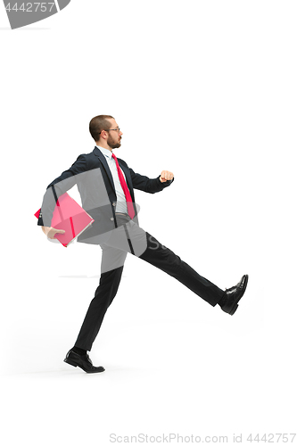 Image of Full body portrait of businessman with folder on white