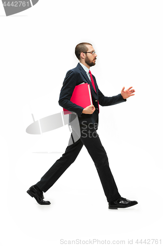 Image of Full body portrait of businessman with folder on white