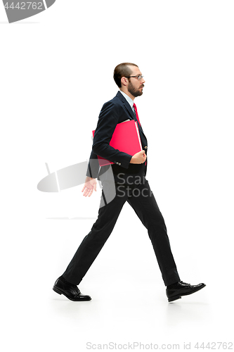 Image of Full body portrait of businessman with folder on white