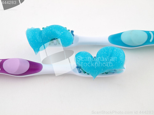 Image of Two Toothbrushes with Gel Paste