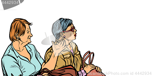 Image of two elderly women discuss