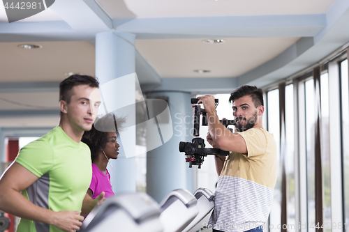 Image of people exercisinng a cardio on treadmill in gym