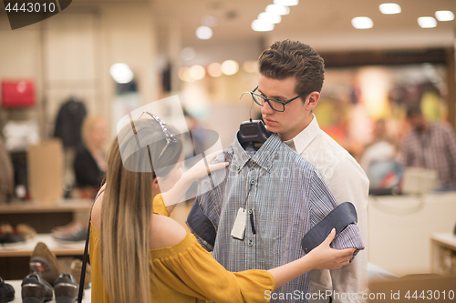 Image of couple in  Clothing Store