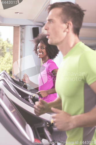 Image of people exercisinng a cardio on treadmill