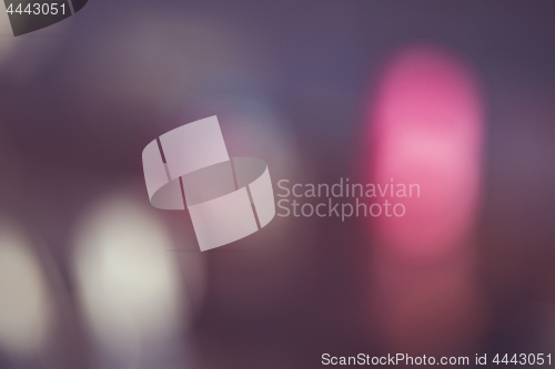 Image of Blurry violet background with abstract pink lights